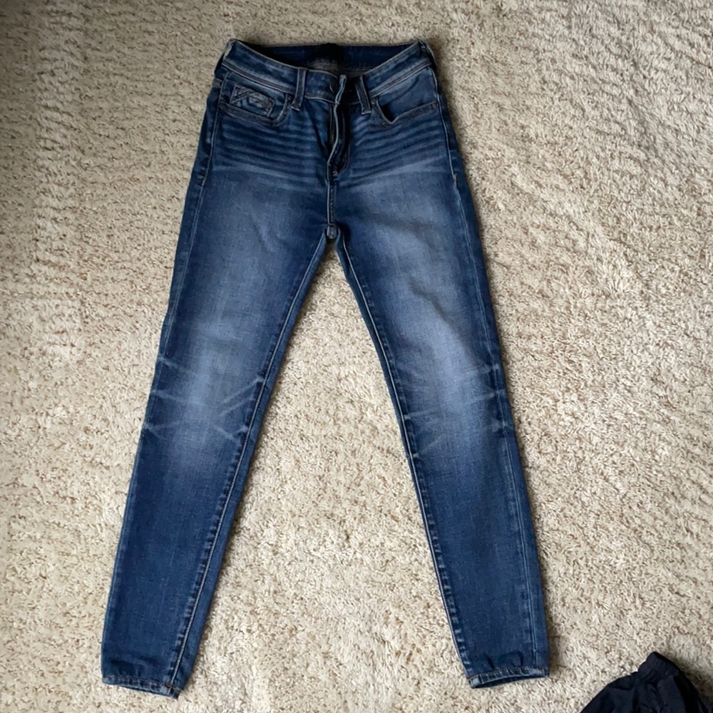 Buckle black high rise skinny jeans